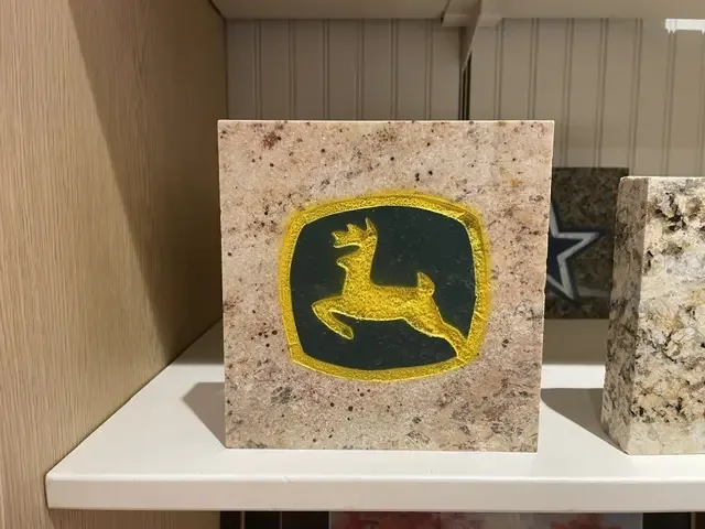 Deer emblem polished granite