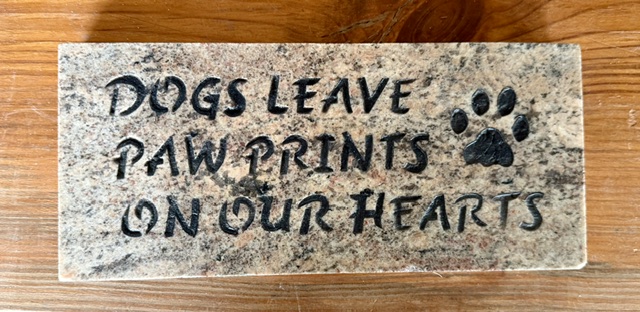 Dogs Leave Paw Prints engraved in granite