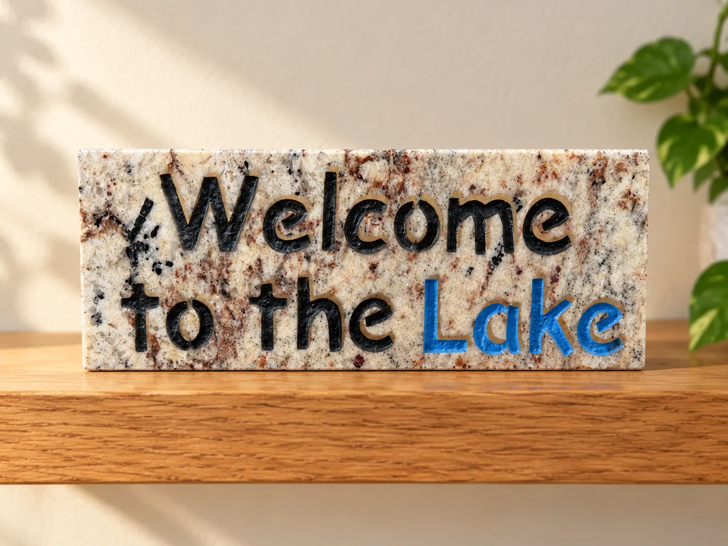 Welcome to the Lake engraved in granite